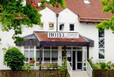 Отель Hotel Garni am Waldhang в городе Гильхинг, Германия