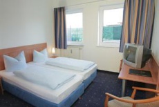 Отель Hotel Fresh Inn в городе Унтерхахинг, Германия