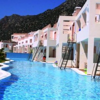 Отель Mitsis Family Village Beach Hotel в городе Кардамаина, Греция