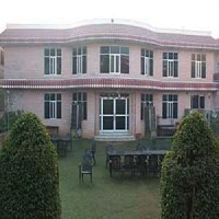 Отель Rajdhani Tourist Motel в городе Котпутли, Индия