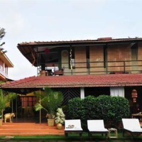 Отель Papa Jollys Spiritual Holidays A Botique Hotel в городе Морджим, Индия