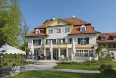 Отель Biohotel Schlossgut Oberambach в городе Мюнзинг, Германия