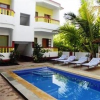 Отель V & M Calisto Guest House Morjim в городе Мандрем Бич, Индия