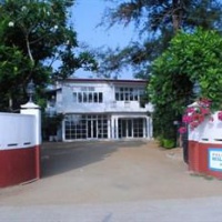 Отель Palm Grove Holiday Inn в городе Поттувил, Шри-Ланка