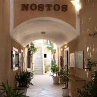 Отель Nostos Hotel Kamari в городе Камари, Греция