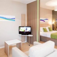 Отель Quality Suites Lyon 7 Lodge в городе Лион, Франция