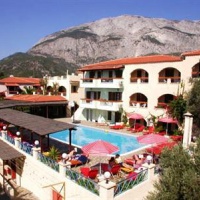 Отель Kampos Village Aparthotel Karlovasi в городе Карловаси, Греция