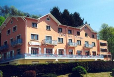 Отель Hotel Perle Des Vosges Muhlbach-sur-Munster в городе Мюльбаш-Сюр-Мюнште, Франция
