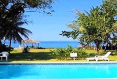 Отель Paradise 8 Bedroom Private Beachfront Villa в городе Rio Nuevo, Ямайка