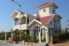 Отель Menezes Luxury Service Villa в городе Деванахолли, Индия