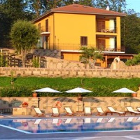 Отель Bellavigna Country House в городе Монтефальсионе, Италия