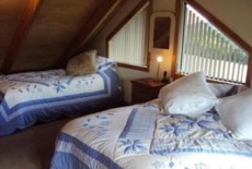 Отель The Hollows Luxury Log Cabin в городе Те-Анау, Новая Зеландия