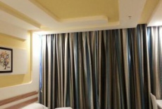 Отель Crowning Clouds Hotel Dehong в городе Дэхун, Китай