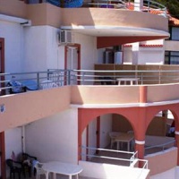 Отель Harbour View Oceanis Apartments в городе Порос, Греция