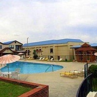 Отель Alpine Lodge & Suites в городе Куквилл, США
