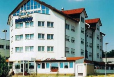 Отель Rainbow Hotel Heusenstamm в городе Хойзенштамм, Германия
