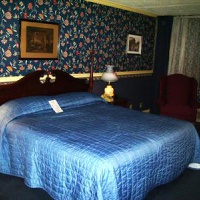 Отель Red Carpet Inn & FantaSuites Greenwood в городе Гринвуд, США