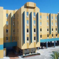 Отель Cocoa Beach Suites Hotel в городе Коко-Бич, США