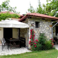 Отель Ninemia Bungalows Resort Karpenisi в городе Voutyro, Греция