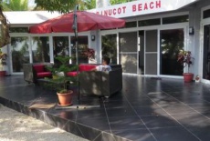 Отель Binucot Beach Resort в городе Феррол, Филиппины