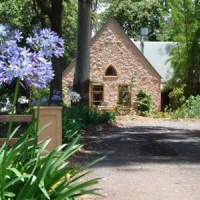 Отель Witches Falls Cottages в городе Норт-Тамборин, Австралия