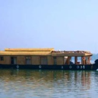 Отель The Lotus - Houseboat в городе Нилешварам, Индия