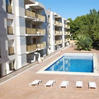 Отель Pins Marina Apartments в городе Камбрильс, Испания