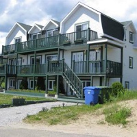 Отель Hotel Sous La Croix в городе Тадуссак, Канада
