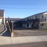 Отель Outpost Motel в городе Кардстон, Альберта, Канада