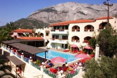 Отель Kampos Village Aparthotel Karlovasi в городе Карловаси, Греция