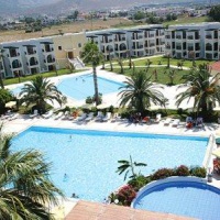 Отель Tigaki Beach Hotel в городе Тингаки, Греция