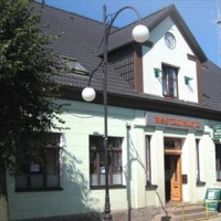 Отель Dom Wczasowy Pod Zegarem в городе Леба, Польша