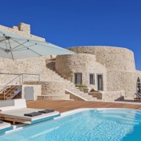 Отель Kamini Santorini Villas в городе Пиргос, Греция