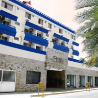 Отель Imperial Hotel Playa El Agua в городе Порламар, Венесуэла