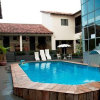 Отель Hotel Pousada Tropical в городе Барра-ду-Гарсас, Бразилия