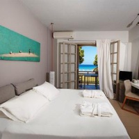 Отель The Bay Hotel & Suites в городе Василикос, Греция