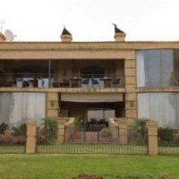 Отель Leopardsong Golf Lodge Centurion в городе Центурион, Южная Африка