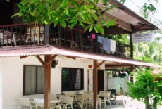 Отель Shalini's Guest House в городе Бату-Ферринги, Малайзия
