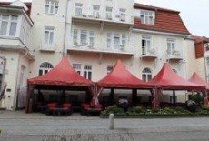 Отель Villa Astoria - Suiten am Meer в городе Кюлунгсборн, Германия