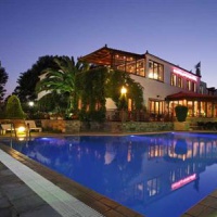 Отель Castello Rosso Hotel в городе Styra, Греция