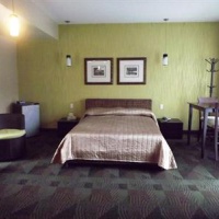 Отель Motel Falcon Brossard в городе Лонгёй, Канада