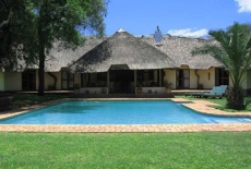 Отель Mziki Safari Lodge в городе Бритс, Южная Африка