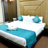 Отель OYO Premium Alankar Circle Vijayawada в городе Виджаявада, Индия