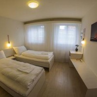 Отель Easy - Living Budget Rooms в городе Литтау, Швейцария