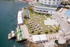 Отель Lamos Resort Hotel & Convention Center Kumkuyu в городе Kumkuyu, Турция