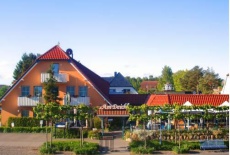 Отель Hotel Garni am Deich в городе Цингст, Германия