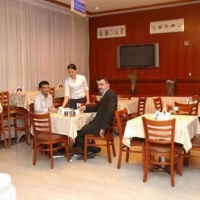 Отель Pangulf Hotel Suites Sharjah в городе Шарджа, ОАЭ