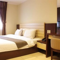 Отель Travellers Suites Hotel Sumatera Utara в городе Медан, Индонезия
