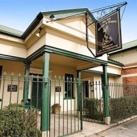 Отель Old George & Dragon Guesthouse в городе Ист-Мейтланд, Австралия