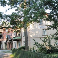 Отель Kursiu kiemas-Villa Bachmann в городе Юодкранте, Литва